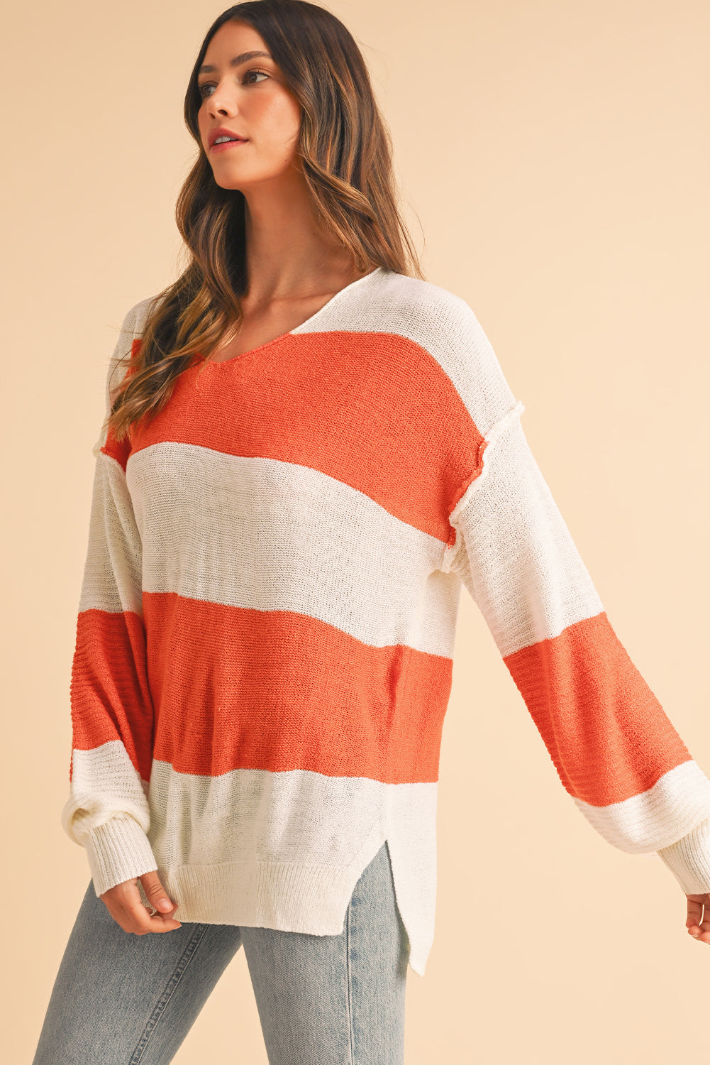 Orange Colorblock V Neck Side Slits SweaterMaterial:100%Acrylic

• Stand out in style with our sweater, blending casual stripes with a trendy rib-knit design.
• The vibrant orange hues add a pop of color to