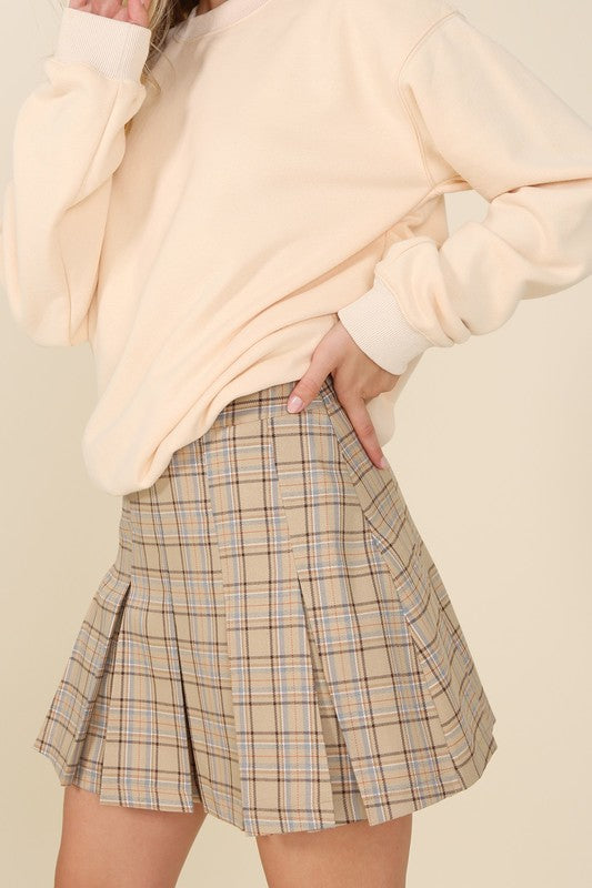 Plaid pleated mini skirt- Plaid pleated mini skirt, 6 pin-tucks for each front and back, side zipper for opening- Pattern type : plaid- Stretch : stretch- Sheer : not lined, but not sheer- 