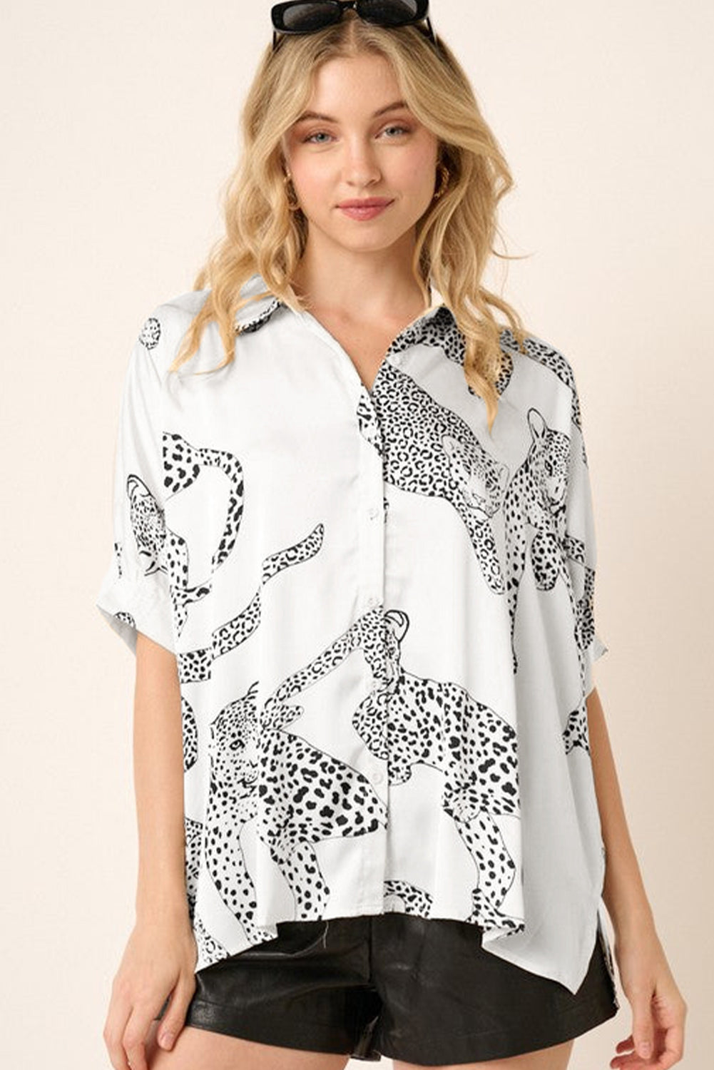 Beige Cheetah Print Buttoned Half Sleeve BlouseMaterial:100%Polyester



		The blouse features a trendy and eye-catching cheetah print pattern, adding a bold and stylish touch to your outfit.
	
	
		Made from