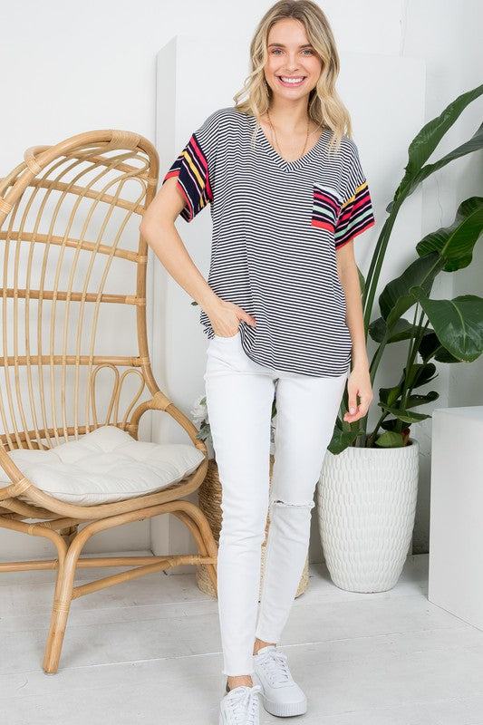 MULTI STRIPE BOXY TOP- Multi stripe boxy top- Pullover short sleeves- V neck chest pocket- Multi stripe jersey - Model is 5' 8" 34-24-34 and wearing a Small- S/M/L 2-2-2- 95% RAYON, 5% S