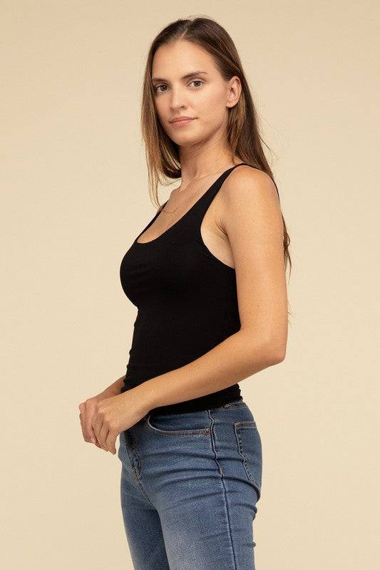 Double Layer Round Neck Tank TopThe Double Layer Round Neck Tank Top offers a stylish and comfortable option for any wardrobe. Featuring a classic round neckline and a unique double-layer design, t