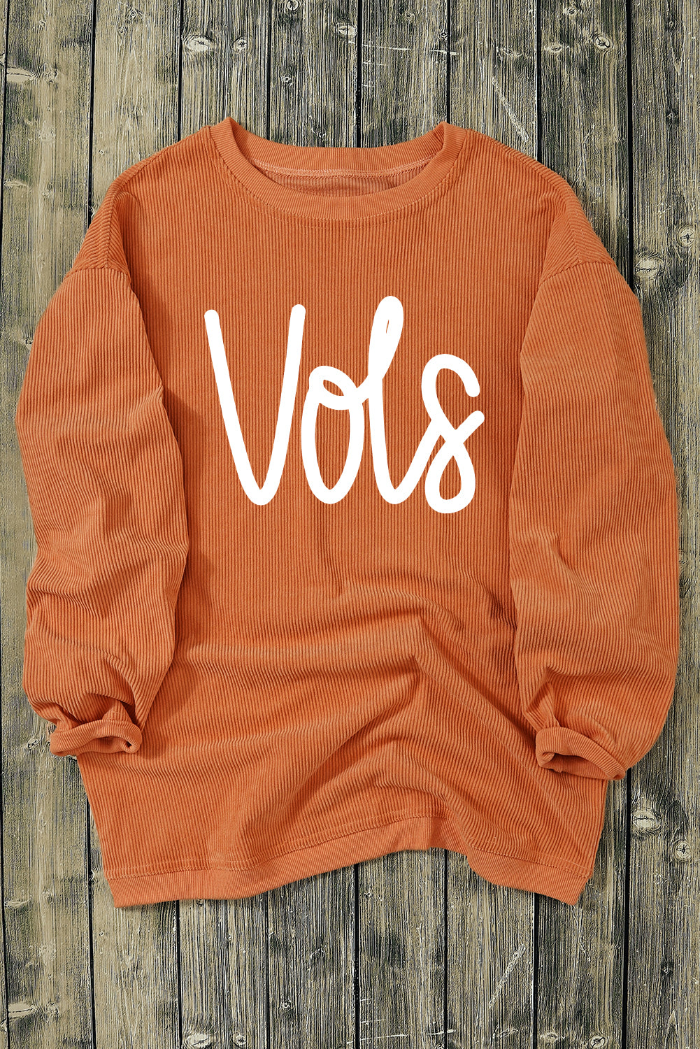 Orange Vols Letter Graphic Crinkle Ribbed Oversized SweatshirtMaterial:100%Polyester

• Vibrant orange hue adds a pop of color to your wardrobe, perfect for standing out in a crowd. 
• Oversized fit provides comfort and a rel