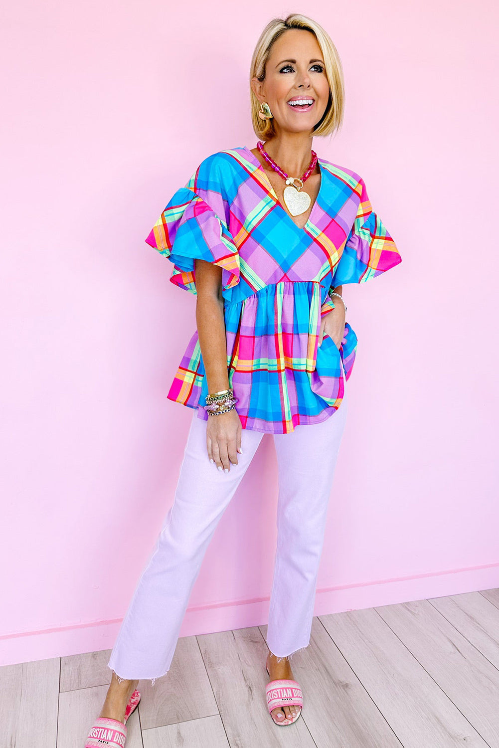 Sky Blue Colorful Plaid V Neck Ruffled Babydoll BlouseMaterial:100%Polyester



		This plaid blouse is vibrant and attention-getting
	
	
		The babydoll design is very graceful and loved by customers
	
	
		Sexy v