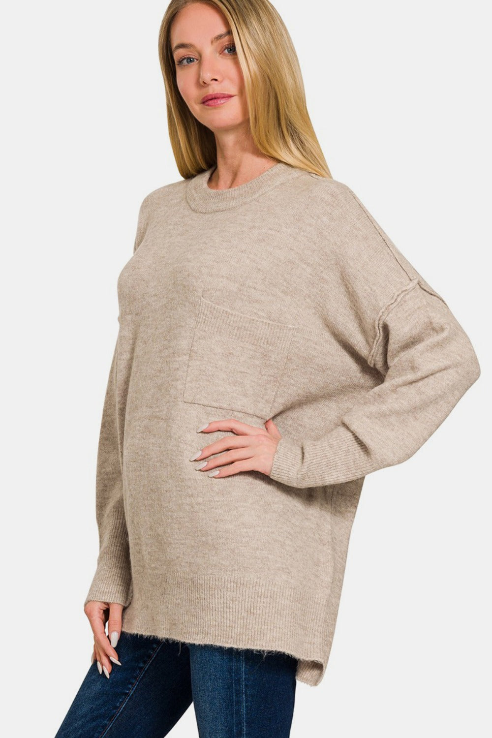 Zenana High-Low Hem Drop Shoulder SweaterThis hi-low hem pocket sweater is crafted from soft and midweight material, making it both cozy and comfortable for everyday wear. The hi-low hem adds a trendy touch