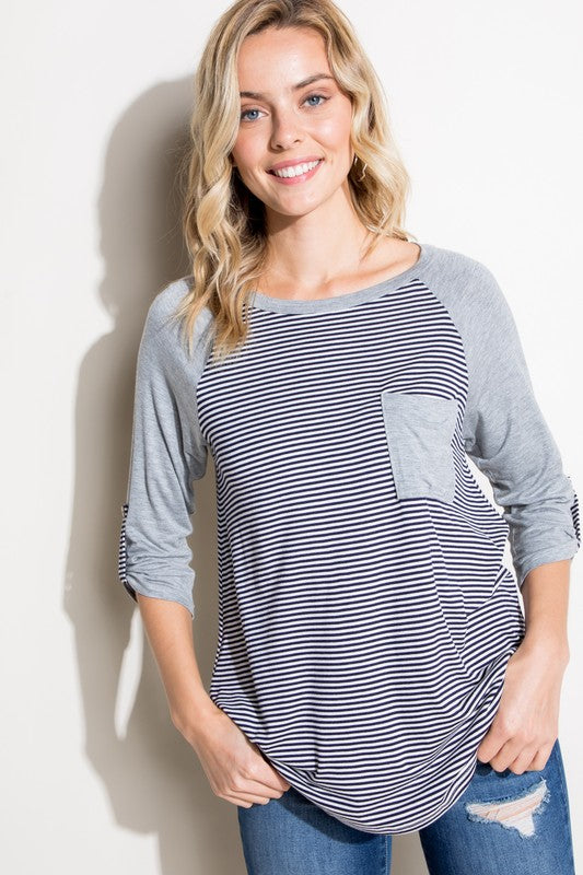 STRIPE SOLID ROLL UP SLEEVE TOPPIN STRIPE AND SOLID MIXED ROUND NECK POCKET ROLL OVER 3/4 SLEEVE TOP- MADE IN U.S.A.
Style: Casual
Print / Pattern: PIN STRIPE AND SOLID
Fit: Regular
Neck Line: ROU