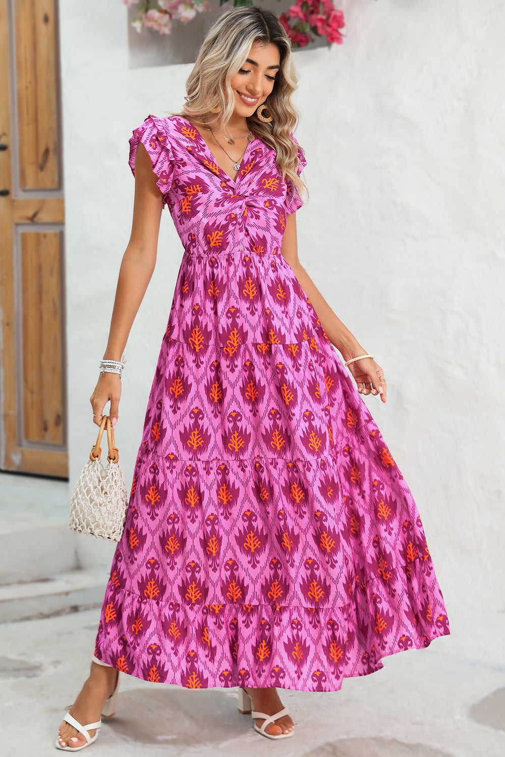 Bonbon Boho Abstract Print Ruffle Tiered Maxi DressMaterial:81%Viscose+19%Polyamide



		The dress embodies a bohemian style, characterized by its free-spirited and relaxed aesthetic. 
	
	
		The maxi length of t