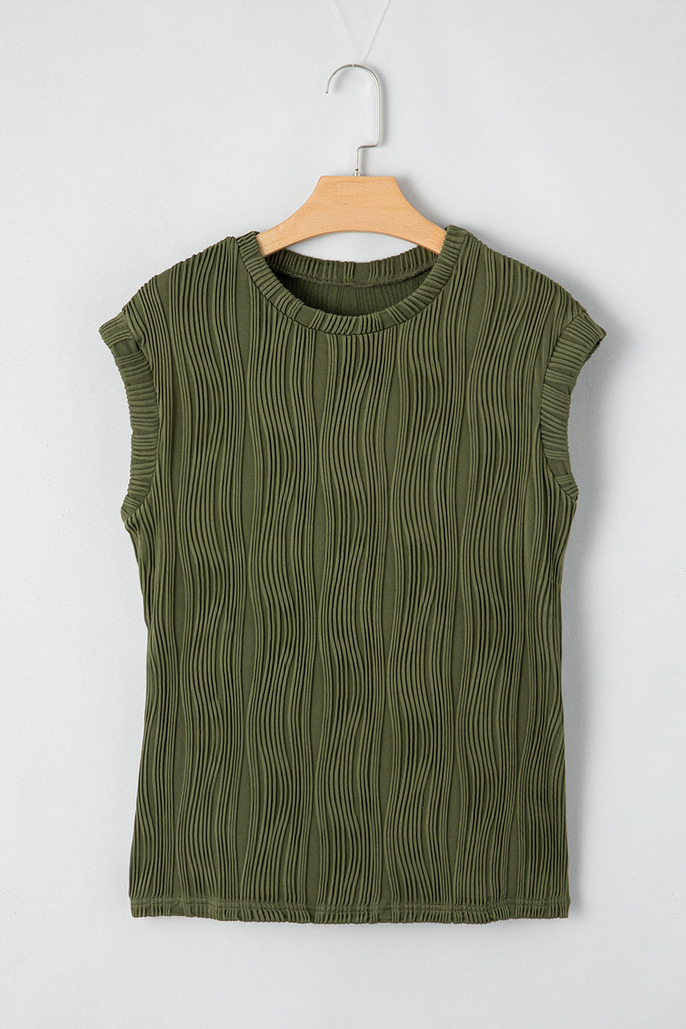 Jungle Green Wavy Textured Cap Sleeve TopMaterial:90%Polyester+10%Elastane


	


		The top features a unique wavy texture, adding a touch of visual interest to your outfit.
	
	
		Made from a soft and