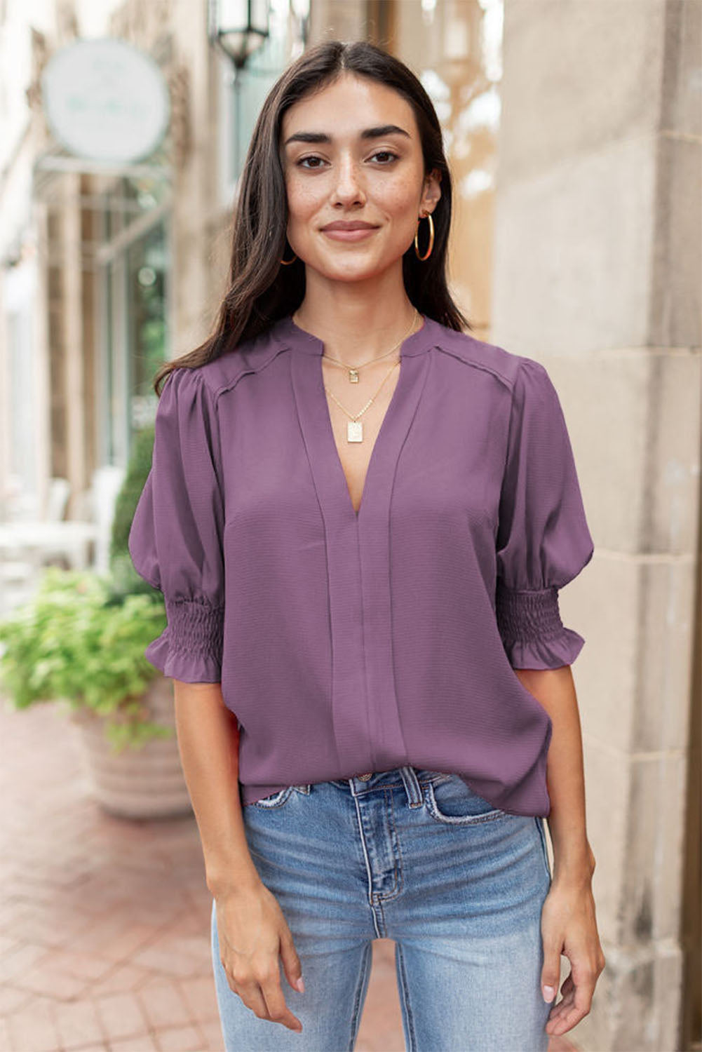 Purple Solid Color Half Sleeve Shirred V Neck BlouseMaterial:100%Polyester



		This solid color blouse allows you to show off an elegant look
	
	
		Featured with v-neckline, puffy sleeves, smocked cuffs, and reg