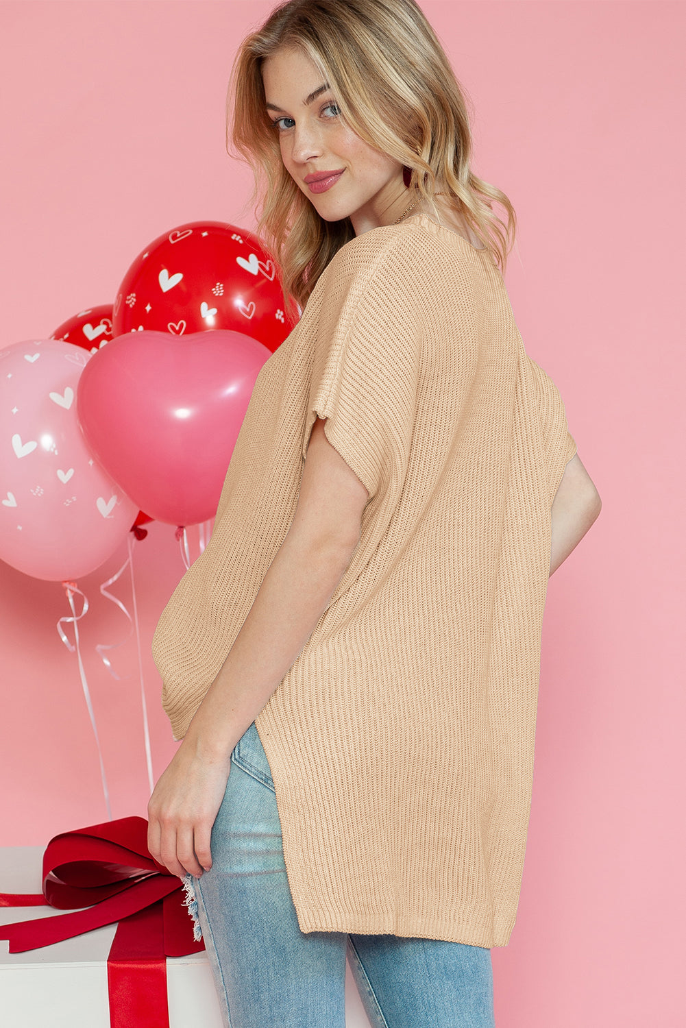 Apricot Side Slit Short Sleeve Oversized SweaterMaterial:55%Acrylic+45%Cotton



		The sweater is a comfortable and chic addition to your wardrobe. Made from breathable, lightweight, and stretchy knitted fabric,