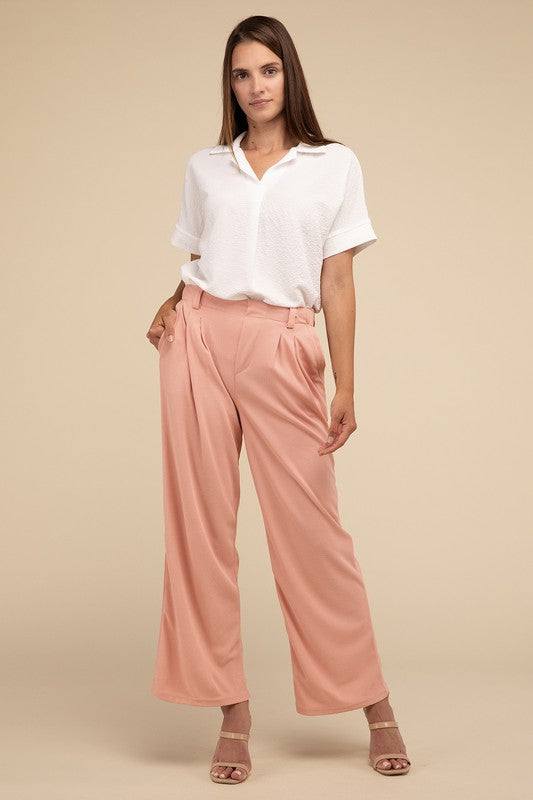 Waffle Trouser PantsElevate your everyday style with these waffle trouser pants. Crafted from textured waffle-knit fabric, they offer a perfect blend of comfort and sophistication. The 