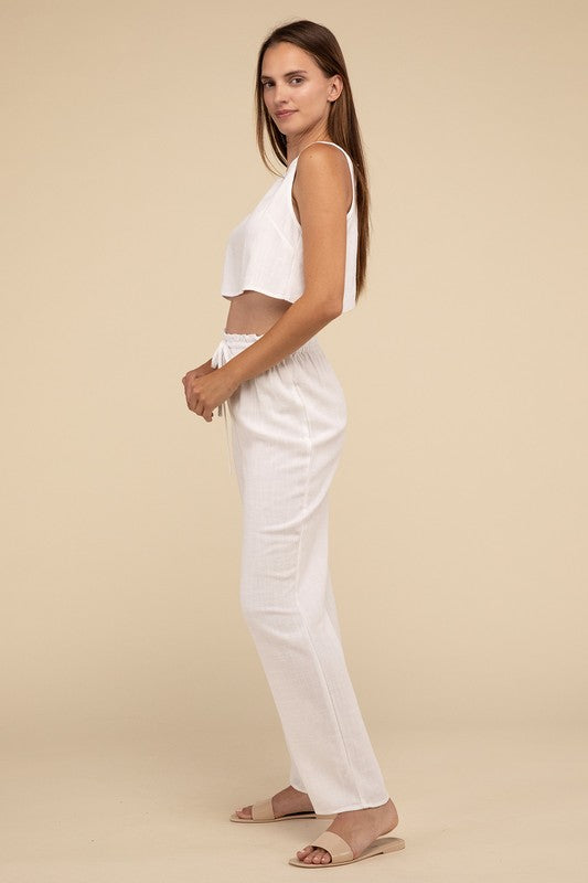 D-Linen Blended Top and Pants SetIndulge in the luxurious comfort of our D-Linen Blended Top and Pants Set. Crafted from a soft rayon-linen blend fabric, this matching set offers both style and comf