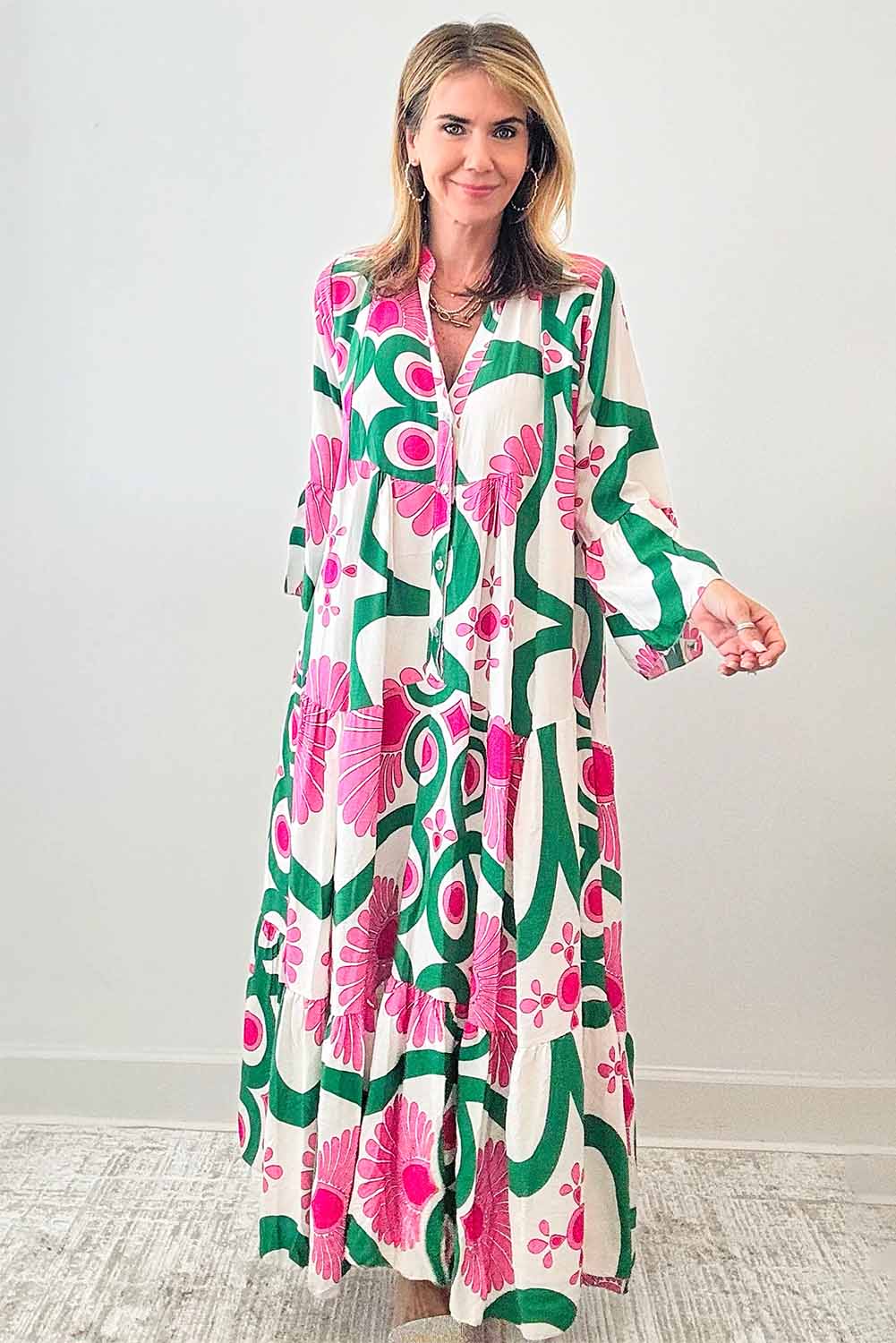 Pink Boho Abstract Button V Neck Oversized Maxi DressMaterial:100%Polyester

• Embrace your inner free spirit with our maxi dress, featuring a stunning abstract pattern and bell sleeves that exude bohemian charm. 
• 