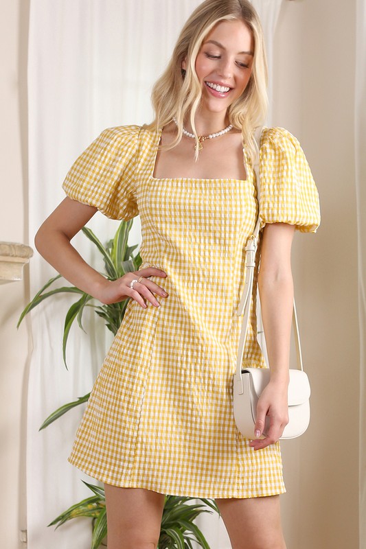 SS back strap dress - gingham*Scoop neck puff sleeve yellow gingham print with back strap dress*Pattern type : gingham pattern*Neck line : square neck*Sleeve type : puff sleeves*Sleeve length : 