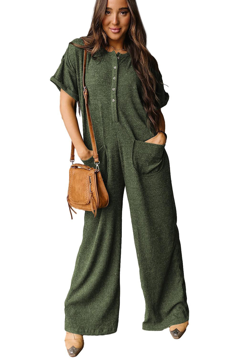 Jungle Green Textured Side Pockets Buttoned Wide Leg JumpsuitMaterial:97%Polyester+3%Elastane

• Stand out in the urban jungle with this jumpsuit, featuring a high waist for a flattering silhouette and wide legs for a chic, m