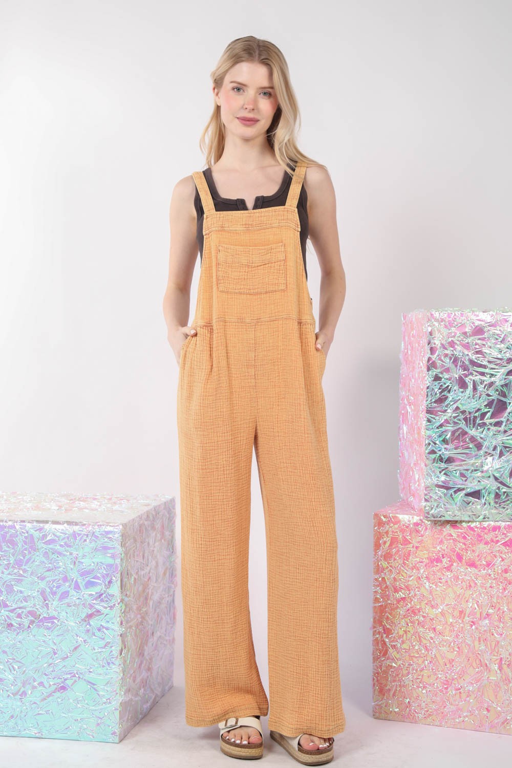 VERY J Texture Washed Wide Leg OverallsThe texture washed wide leg overalls offer a stylish and relaxed look with a touch of vintage charm. Made from textured fabric, these overalls have a unique appearan