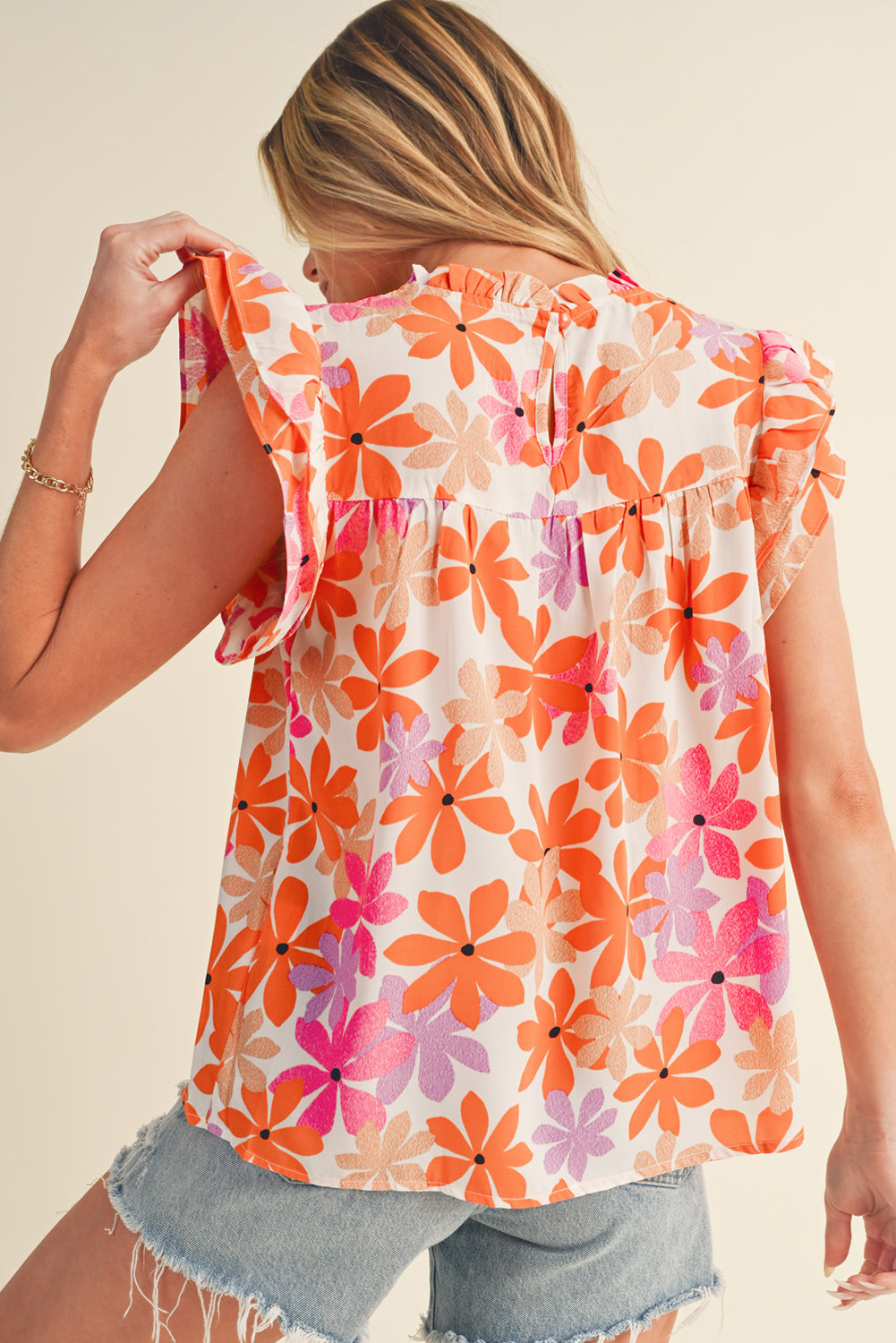 Orange Boho 60s Floral Print Ruffled Sleeve Smocked BlouseMaterial:100%Polyester



		Achieve a sweet and charming look with the floral blouse, designed to complement your style with a floral touch.
	
	
		The addition 