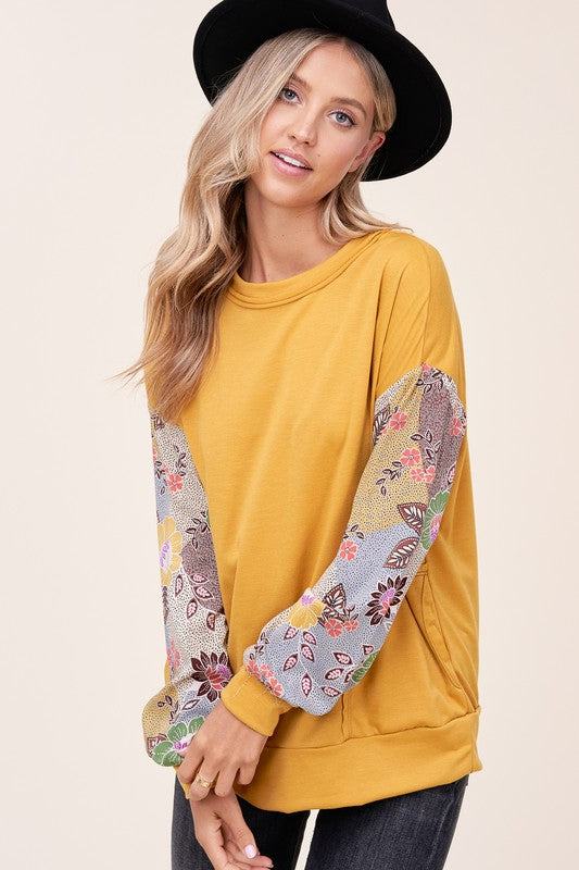 WOVEN FLORAL MIXED TOPFRENCH TERRY SOLID AND WOVEN FLORAL PRINT MIXED LONG SLEEVE SIDE POCKET RAW EDGE DETAIL TOP - MADE IN U.S.A.
Style: Casual
Print / Pattern: SOLID AND WOVEN FLORAL 
F