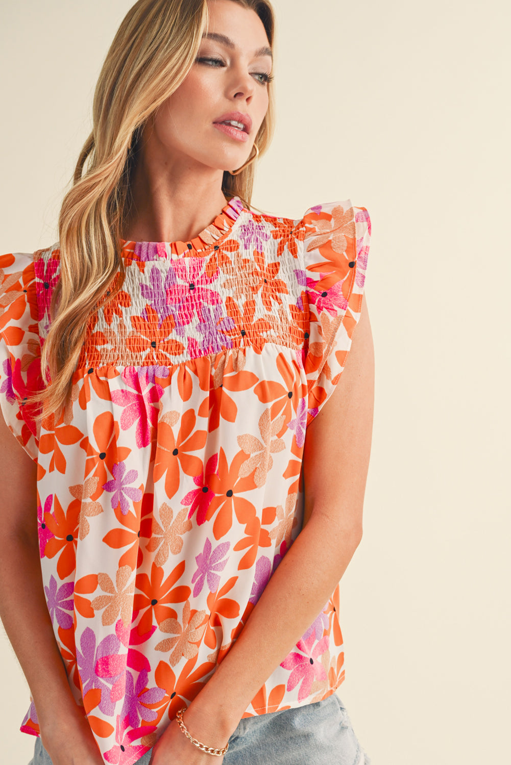 Orange Boho 60s Floral Print Ruffled Sleeve Smocked BlouseMaterial:100%Polyester



		Achieve a sweet and charming look with the floral blouse, designed to complement your style with a floral touch.
	
	
		The addition 