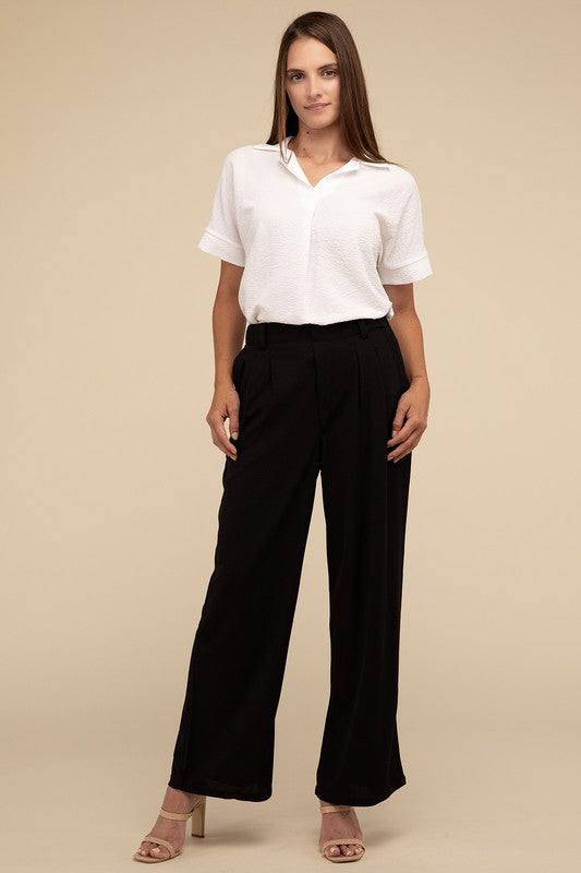 Waffle Trouser PantsElevate your everyday style with these waffle trouser pants. Crafted from textured waffle-knit fabric, they offer a perfect blend of comfort and sophistication. The 