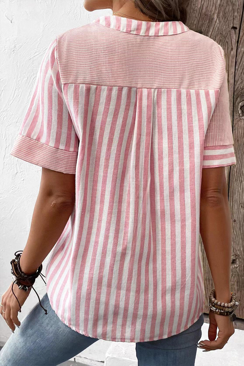 Pink Stripe Henley V-neck Patchwork Blouse• The chic patchwork design adds a trendy touch to the classic V-neck silhouette, offering a unique and fashionable look. 
• Crafted from high-quality fabric, this 