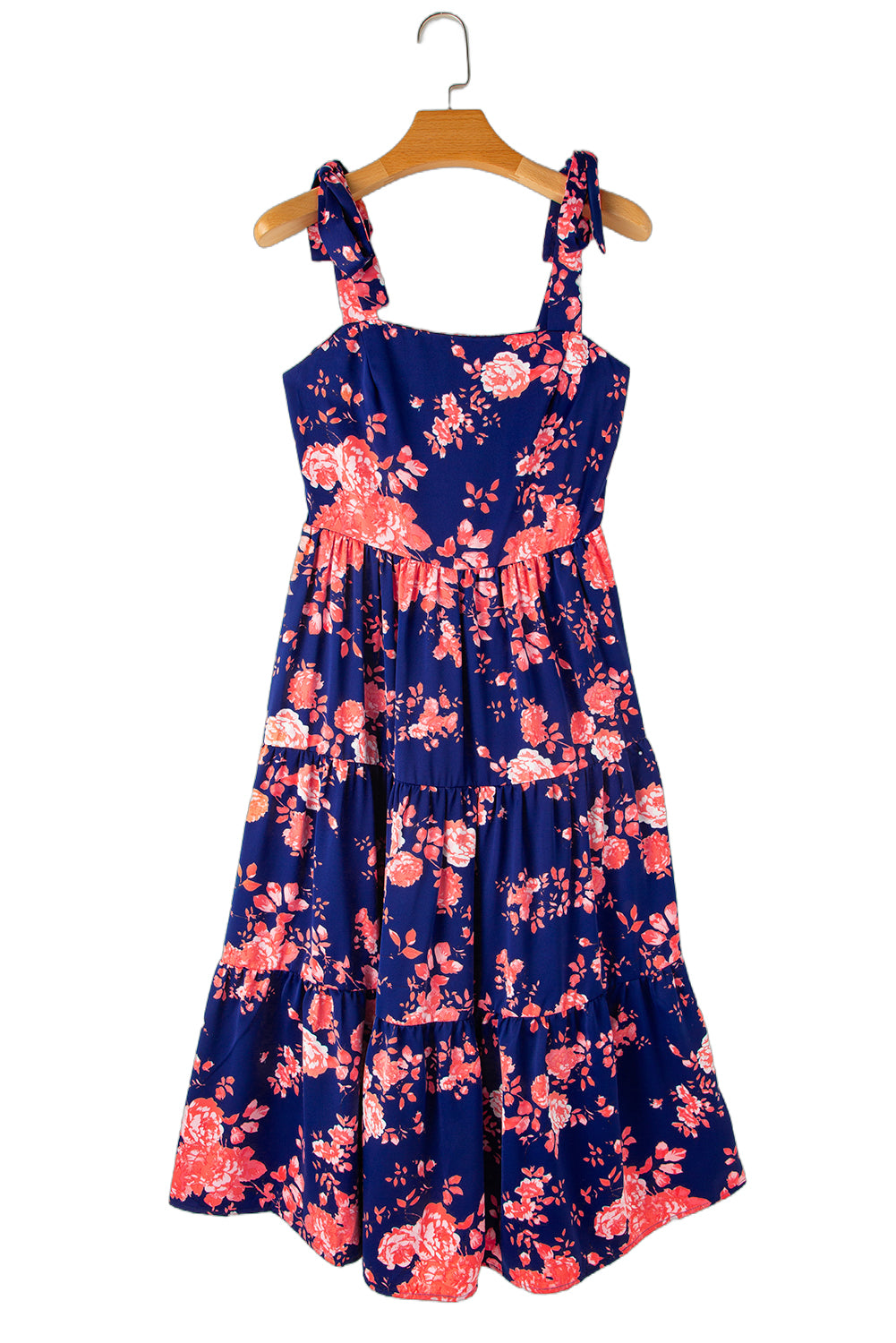 Pink Tie Shoulder Straps Tiered Floral DressMaterial:100%Polyester



		This floral dress is flattering fit to show personal charm
	
	
		The tie shoulder straps are flexible and adjustable
	
	
		The fi