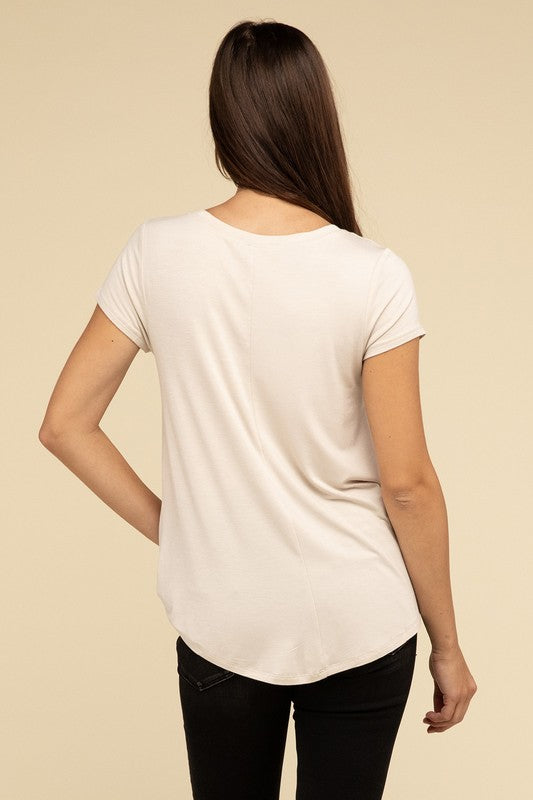 Flowy Round Hem Rayon Short Sleeve TopThe Flowy Round Hem Rayon Short Sleeve Top is the perfect addition to your casual wardrobe. Crafted from soft, lightweight rayon, this top features a relaxed fit and