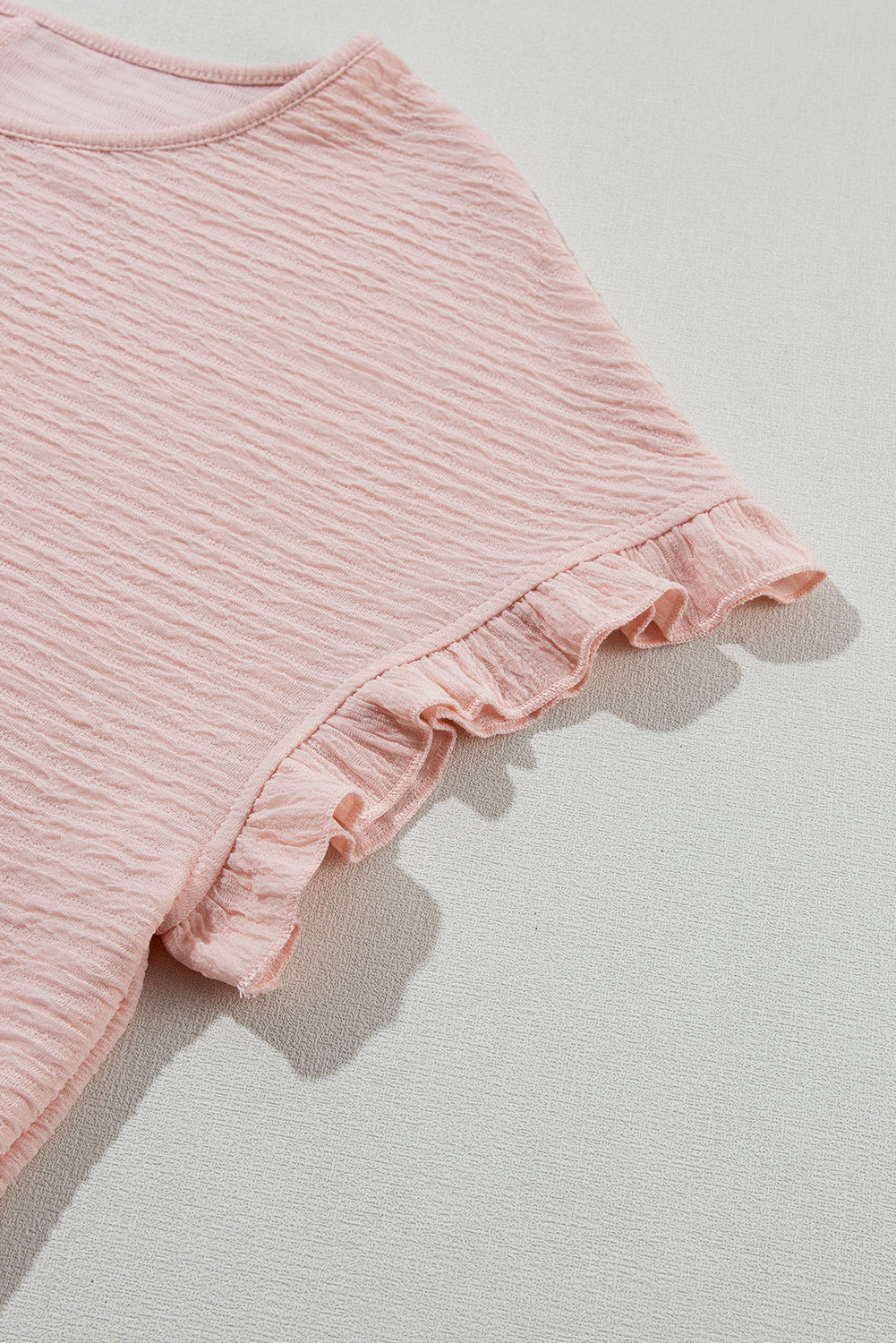 Light Pink Solid Textured Frill Cuffs Short Sleeve BlouseMaterial:95%Polyester+5%Elastane



		Embrace effortless elegance with our blouse, crafted from high-quality fabric for a comfortable and stylish fit.
	
	
		Thi