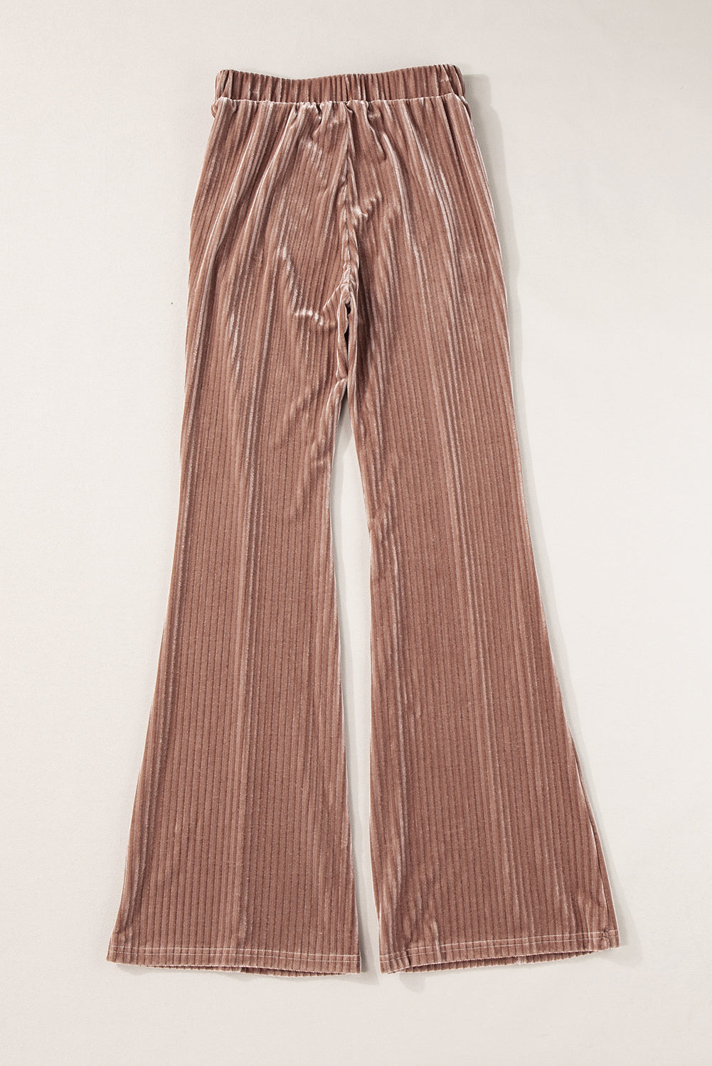 Chestnut Solid Color High Waist Corduroy Flare PantsMaterial:90%Polyester+10%Elastane



		These pants feature a high waist design, which offers a flattering silhouette and can make the wearer's legs appear longer. 