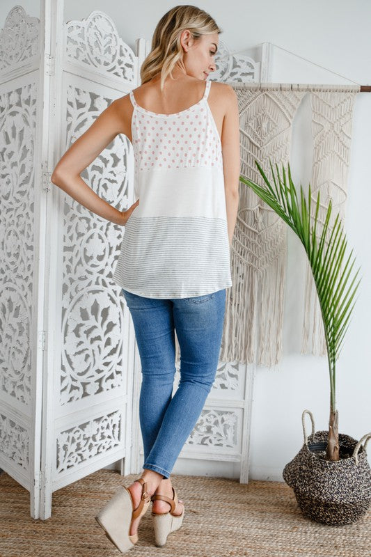 POLKA DOT STRIPE SOLID MIX TANK TOPPOLKA DOT STRIPE SOLID MIXED TANK TOP95% RAYON, 5% SPANDEX MADE IN USAS/M/L 2-2-2
Style: Casual
Print / Pattern: POLKA DOT STRIPE &amp; SOLID
Fit: Regular
Sleeve: Sl