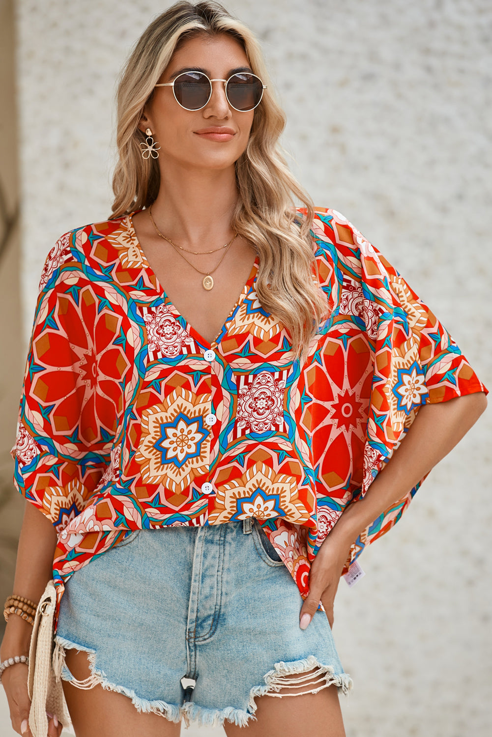 Red Floral Print V Neck Button Decor Batwing BlouseMaterial:100%Polyester



		Flowy floral top: Breezy and comfy with a V-neck and loose batwing sleeves.
	
	
		Button-up floral blouse: Features a flattering V-n