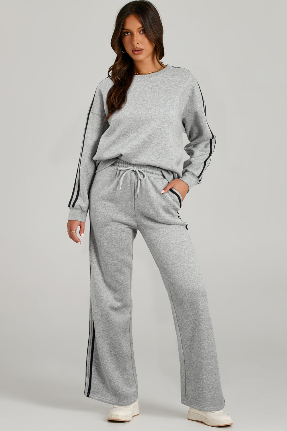 Light Grey Solid Color Side Striped Sweatshirt Pants SetMaterial:50%Polyester+50%Cotton

• This pants set exudes a modern appeal perfect for casual outings or lounging at home.
• Crafted from high-quality fabric for a s