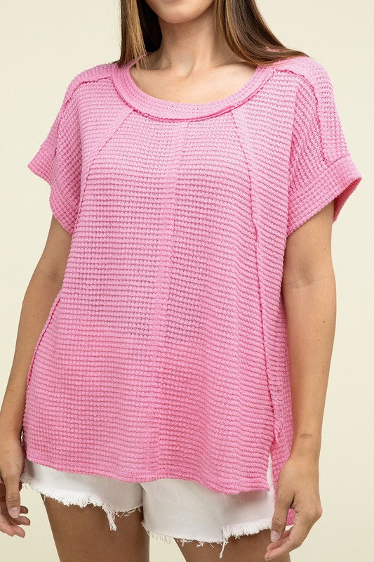 Brushed Waffle Exposed-Seam Short Sleeve TopElevate your casual wardrobe with this Brushed Waffle Top, featuring side slits, exposed seam details, and a stylish hi-low hem. Perfect for a relaxed yet trendy loo