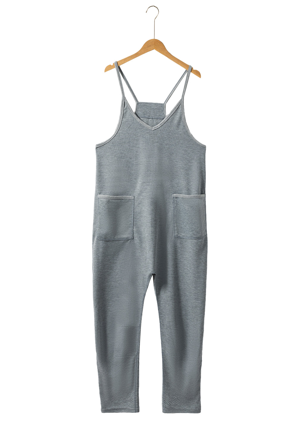 Gray Waffle Knit Spaghetti Strap Pocketed JumpsuitMaterial:95%POLYESTER+5%ELASTANE



		This jumpsuit features delicate spaghetti straps, which give it a feminine and summery look. 
	
	
		The thin straps allow 