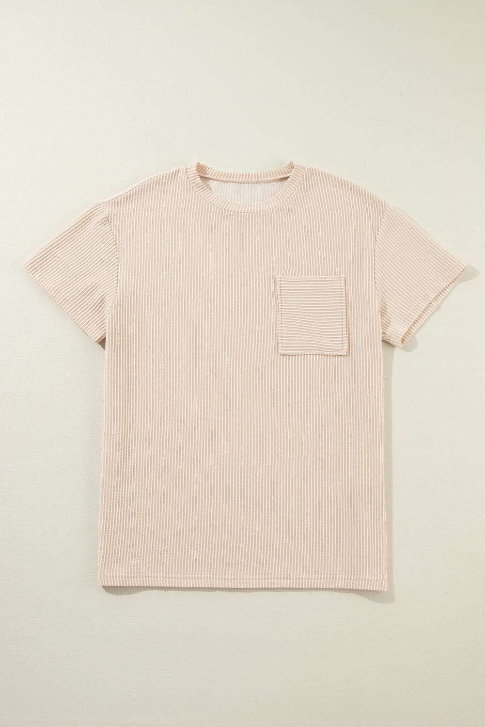 Pink Crinkle Rib Knit Pocketed Loose Fit Crew Neck T ShirtMaterial:75%Polyester+20%Viscose+5%Elastane

• Pink T Shirt offers a charming, feminine touch with its soft pink color and crinkle rib texture, perfect for a casual