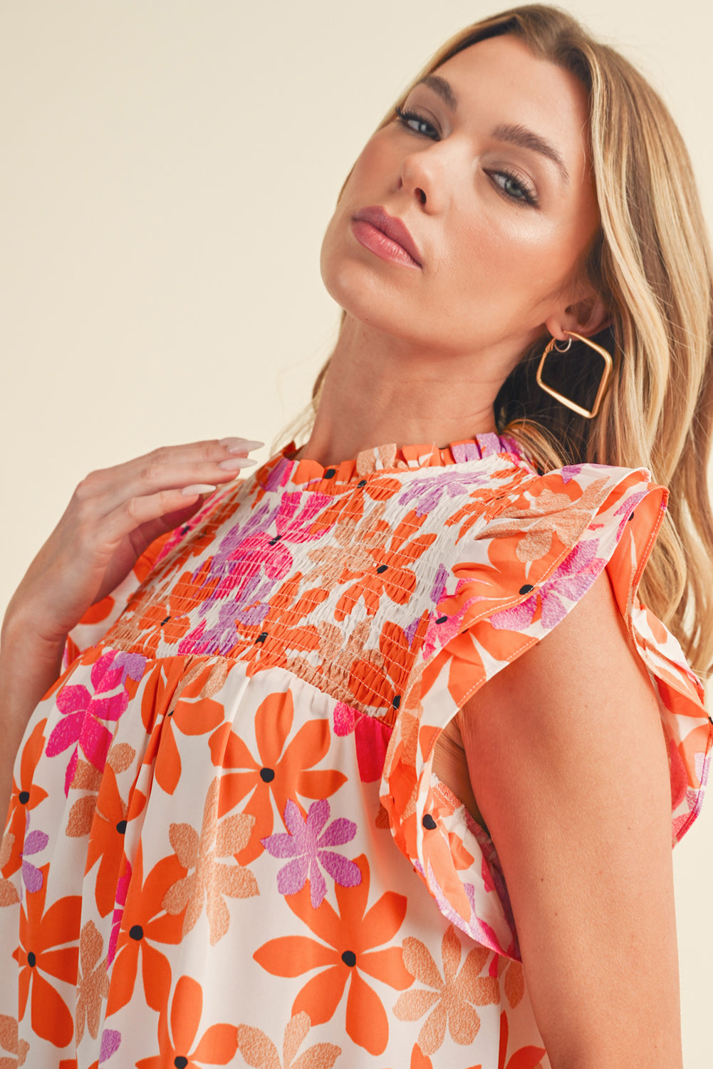 Orange Boho 60s Floral Print Ruffled Sleeve Smocked BlouseMaterial:100%Polyester



		Achieve a sweet and charming look with the floral blouse, designed to complement your style with a floral touch.
	
	
		The addition 