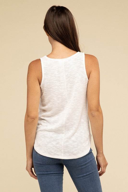 V Neck Sleeveless Cami TopThe V Neck Sleeveless Cami Top is a chic and versatile addition to any wardrobe. Featuring a flattering V neckline and a sleeveless design, this cami top is perfect 