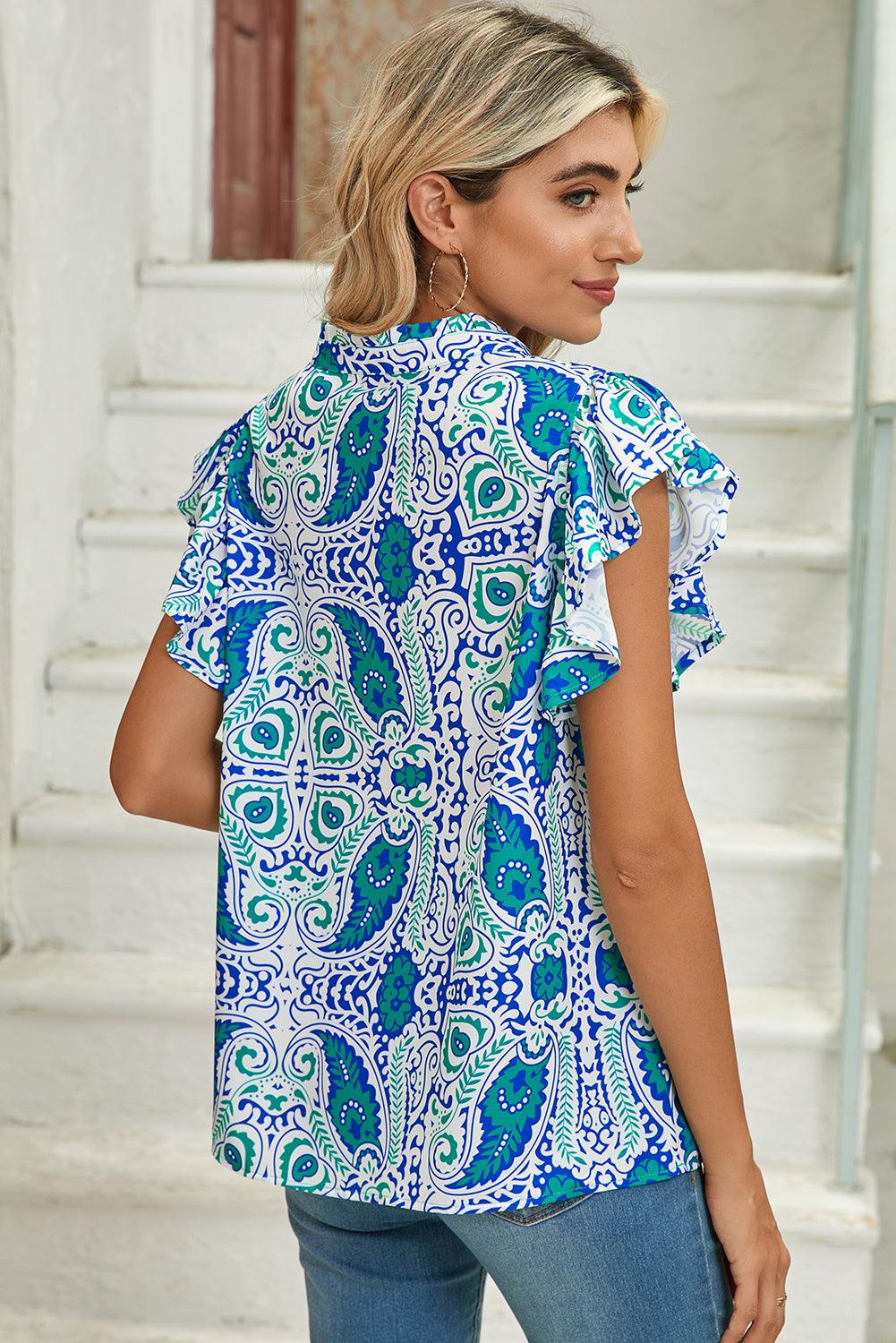 Sky Blue Abstract Print Ruffle Sleeve V Neck BlouseMaterial:100%Polyester

• Elevate your style with this blouse featuring charming ruffle sleeves and a flattering V-neck design, perfect for a boho-chic look. 
• Th