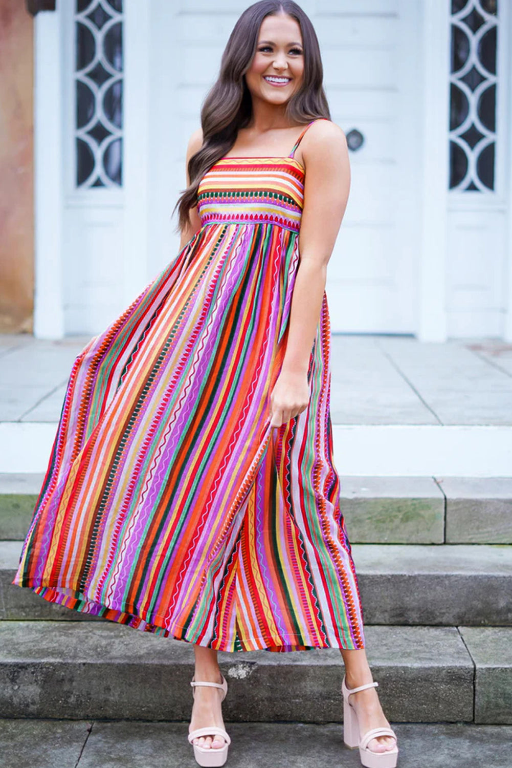 Multicolour Boho Striped Spaghetti Strap Smocked Back Maxi DressMaterial:100%Polyester

• Embrace a vibrant blend of colors in this maxi dress, perfect for daily wear with its relaxed, sleeveless design.
• The shirred back ensu