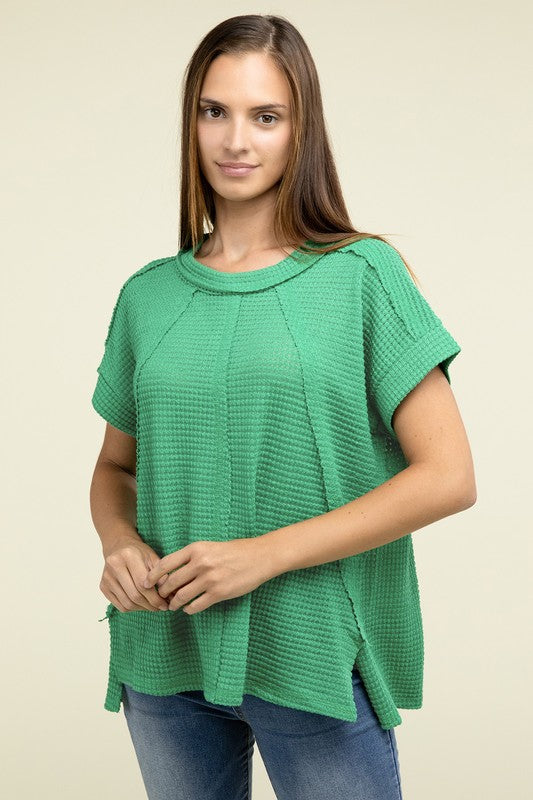 Brushed Waffle Exposed-Seam Short Sleeve TopElevate your casual wardrobe with this Brushed Waffle Top, featuring side slits, exposed seam details, and a stylish hi-low hem. Perfect for a relaxed yet trendy loo