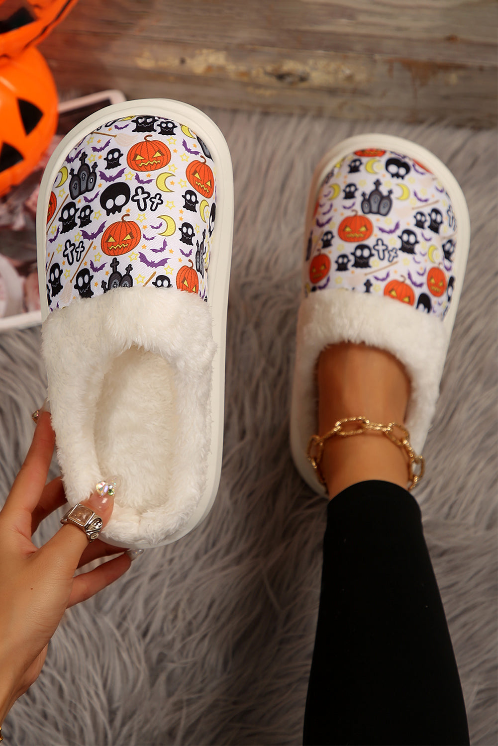 White Halloween Pumpkin Ghost Print Plush Home Slippers• Luxuriously soft and cozy, these plush home slippers feature a charming Halloween pumpkin ghost print, perfect for adding a festive touch to your loungewear.
• Th