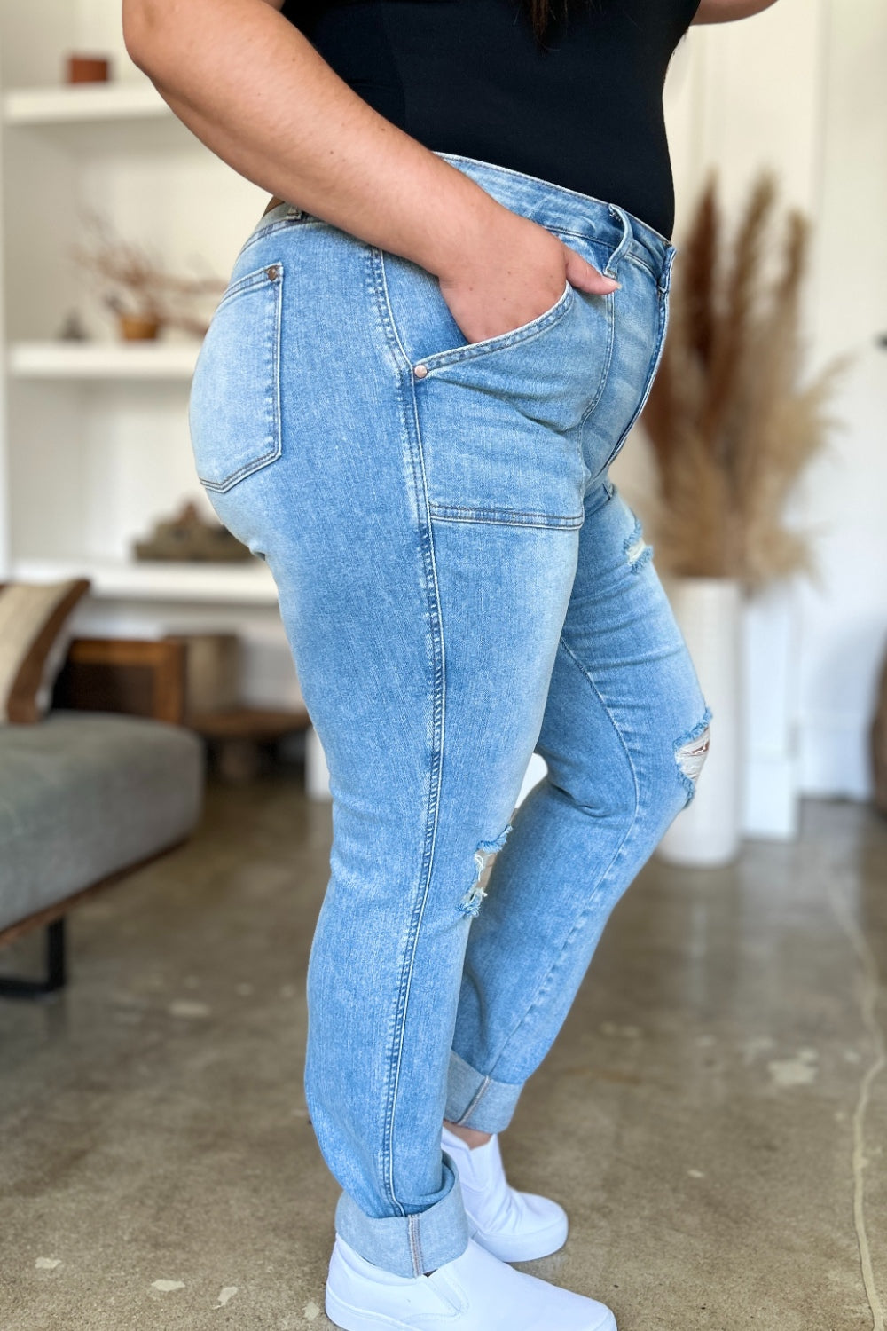 Judy Blue Full Size Distressed Straight Jeans with Patch PocketsThese distressed straight jeans feature stylish patch pockets for added flair. The distressed detailing adds a trendy touch to your look. The straight cut offers a f