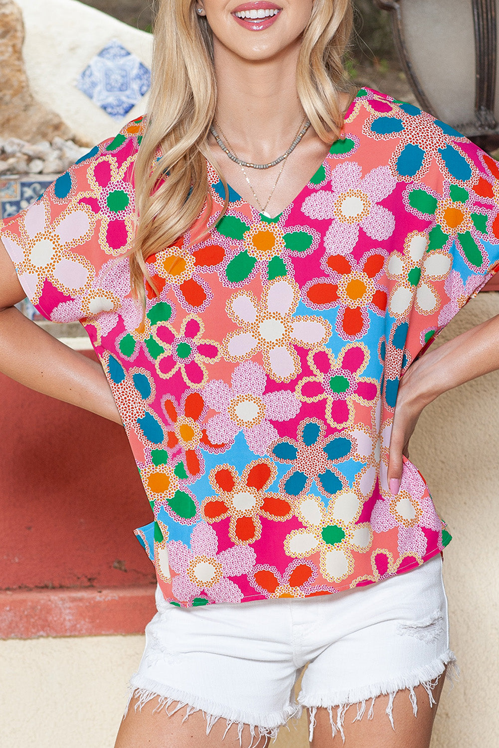 Multicolor Abstract Print V Neck Short Sleeve Dolman BlouseMaterial:100%Polyester



		The
chic blouse has a relaxed fit and dolman sleeves, which create a comfortable
and flattering silhouette
	
	
		The
V-neckline a