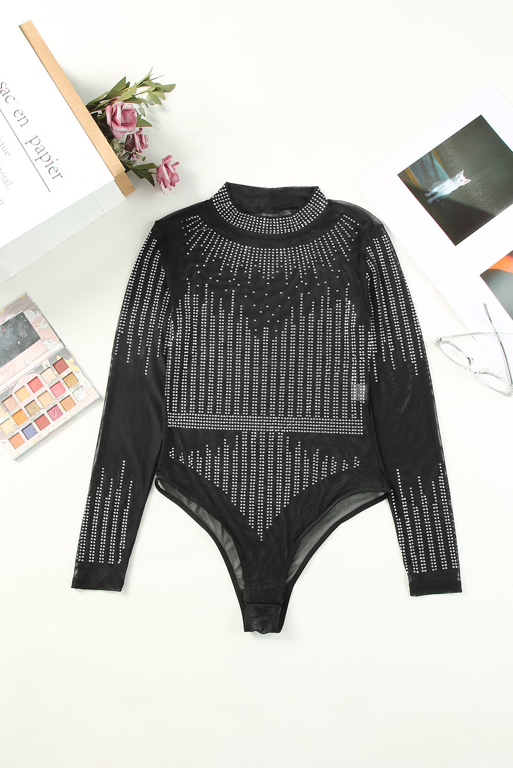 Black Rhinestone Sheer Slim Fit Long Sleeve BodysuitMaterial:95%POLYESTER+5%ELASTANE



		This sheer mesh bodysuit is sexy and charming for women
	
	
		The rhinestone design can light up your special nights
	
	