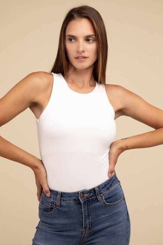 Boat Neck Sleeveless Padded BodysuitThe Boat Neck Sleeveless Padded Bodysuit offers both style and comfort. With its boat neckline and sleeveless design, it provides a sleek and elegant look. The padde