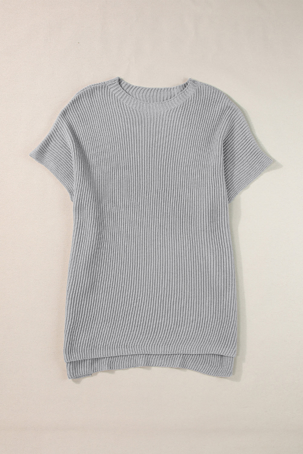 Apricot Side Slit Short Sleeve Oversized SweaterMaterial:55%Acrylic+45%Cotton



		The sweater is a comfortable and chic addition to your wardrobe. Made from breathable, lightweight, and stretchy knitted fabric,