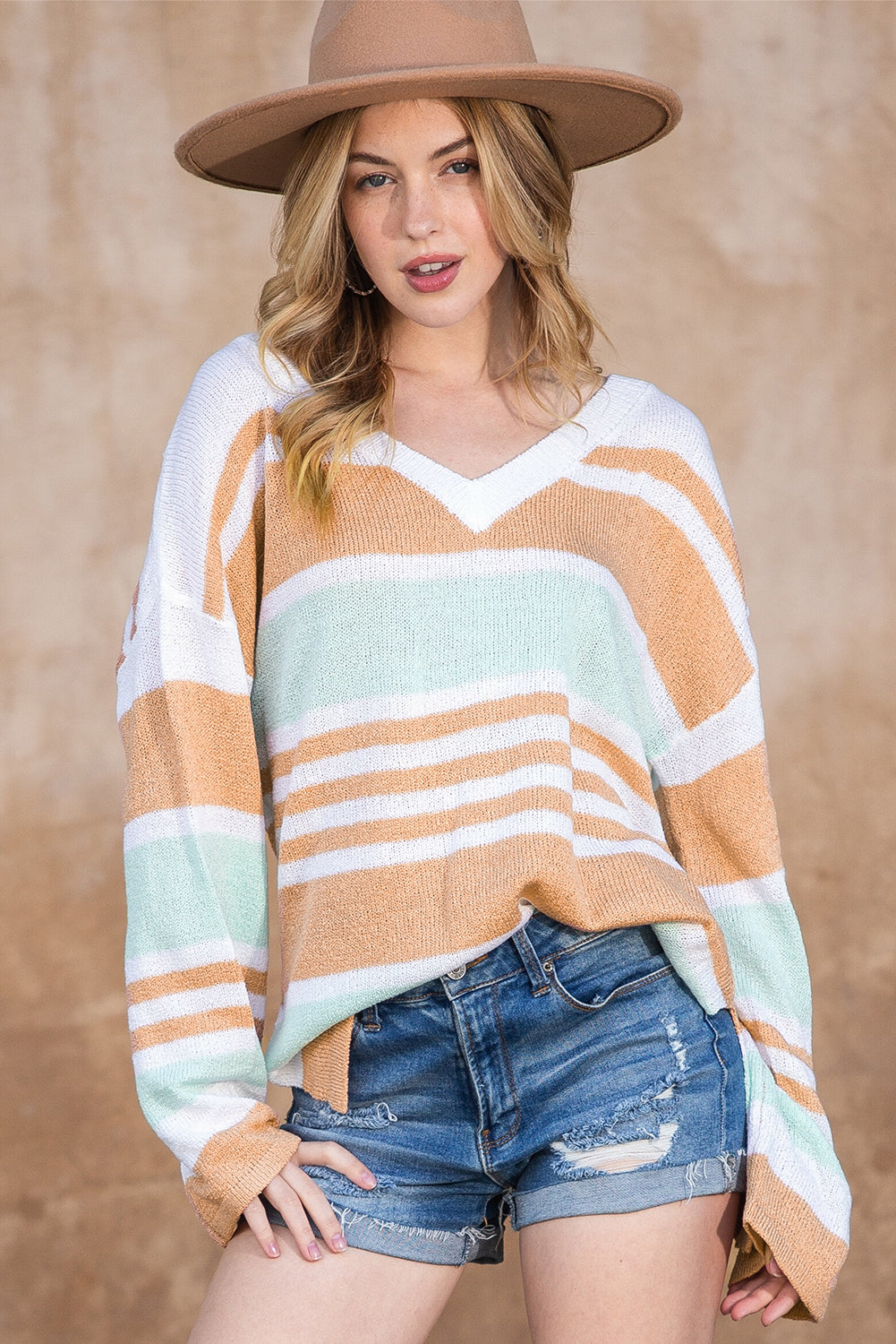 Multicolor Colorblock Stripe V Neck Split SweaterMaterial:100%Acrylic


	


		The V-neckline and split hem add a touch of elegance, while the colorblock design adds a modern and trendy twist.
	
	
		Add a pop