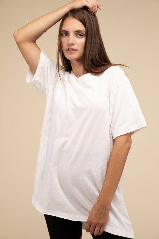 Cotton Drop Shoulder Oversized TopThe Cotton Drop Shoulder Oversized Top is a chic and comfortable addition to your wardrobe. With raw edge details adding a touch of edge, this top offers a relaxed, 