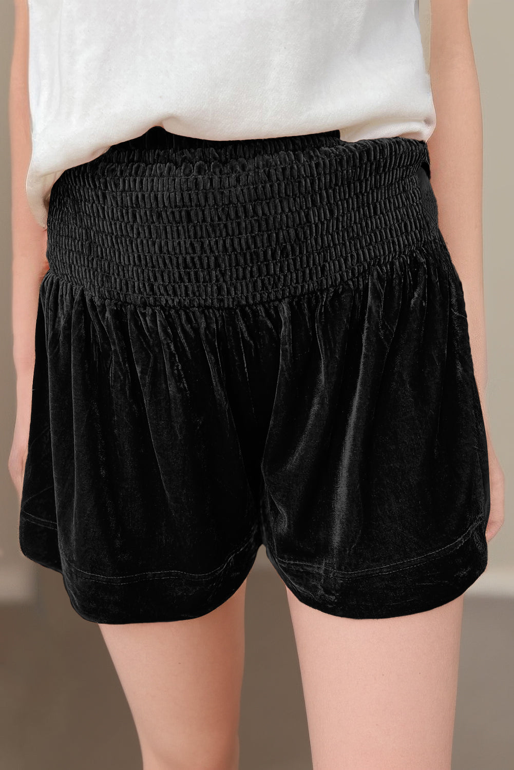 Black Velvet Smocked High Waist ShortsMaterial:95%Polyester+5%Elastane

• Crafted from luxurious black velvet material, these high-waisted shorts offer a sophisticated touch to your everyday wardrobe. 
