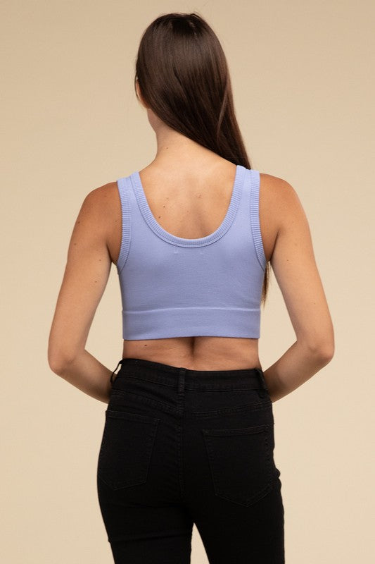 Ribbed Seamless Crop TopElevate your summer essentials with our Ribbed Seamless Crop Top, a versatile piece perfect for layering or wearing solo. Crafted with comfort in mind, it boasts a f