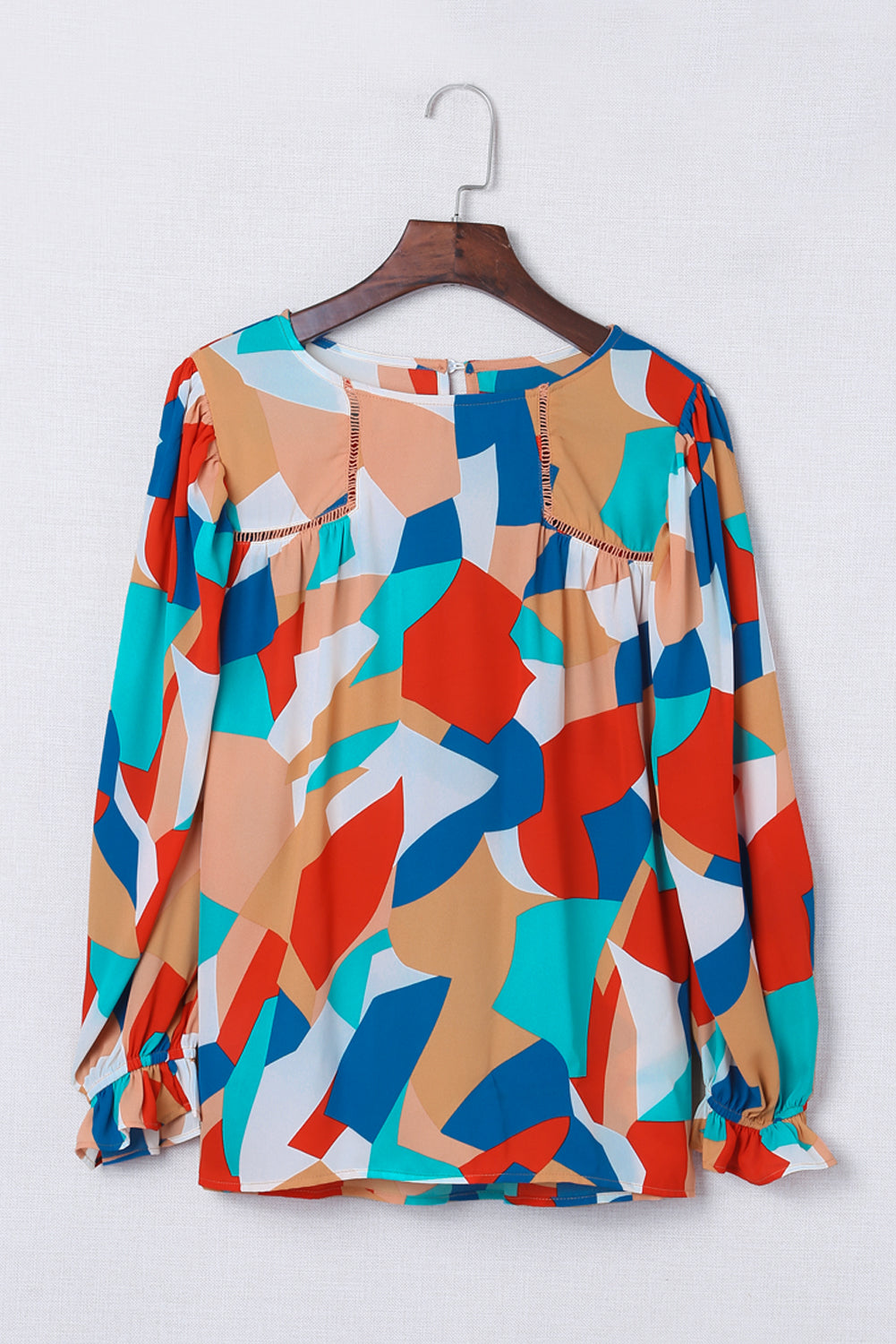 Multicolor Casual Abstract Print Puff Sleeve BlouseMaterial:100%Polyester



		•An artful abstract pattern bursts with bold color on this light and airy blouse.
	
	
		•Highlights: Relaxed fit, long sleeves with 